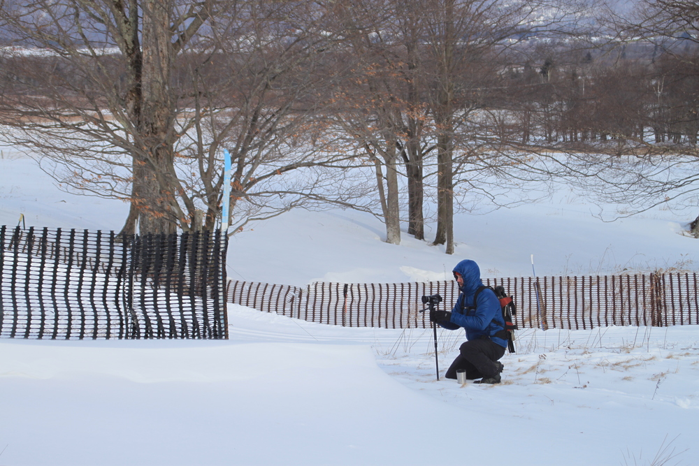 Setting up for a shot during the filming of Episode 3 .