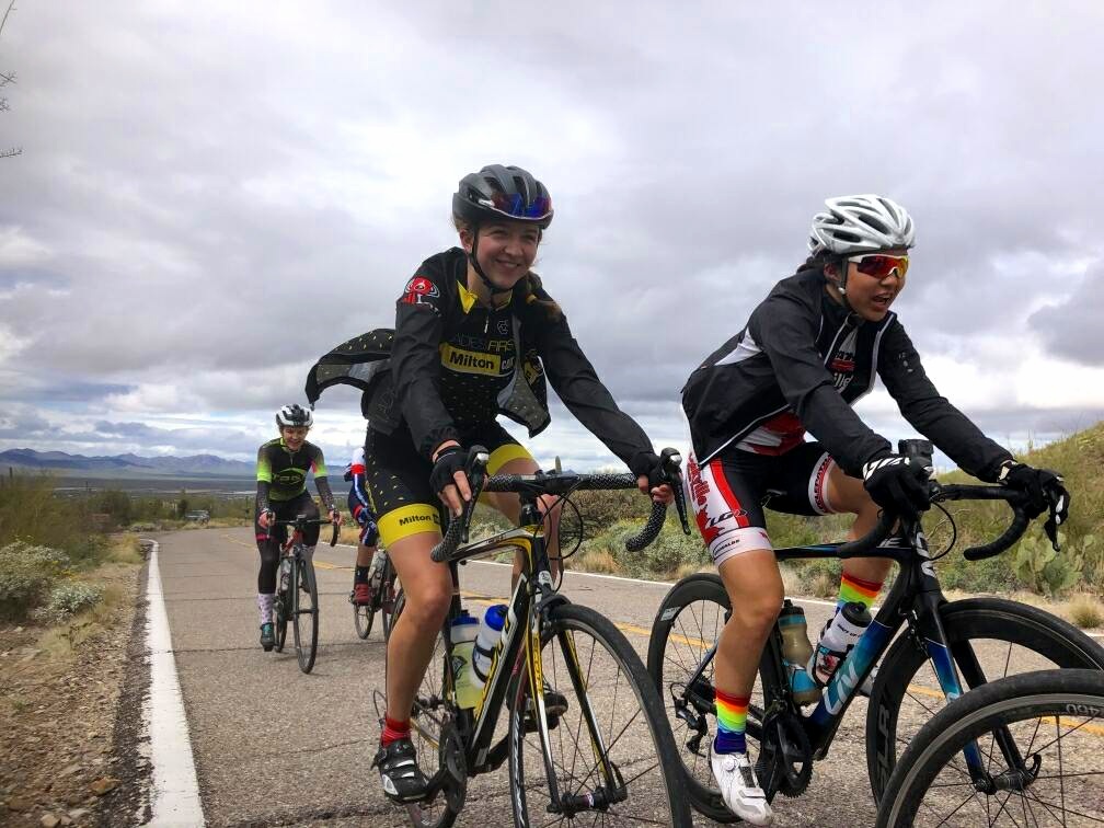 Smiles for miles! Caitrin (center of the photo) getting some good time in the saddle In Tucson, AZ.