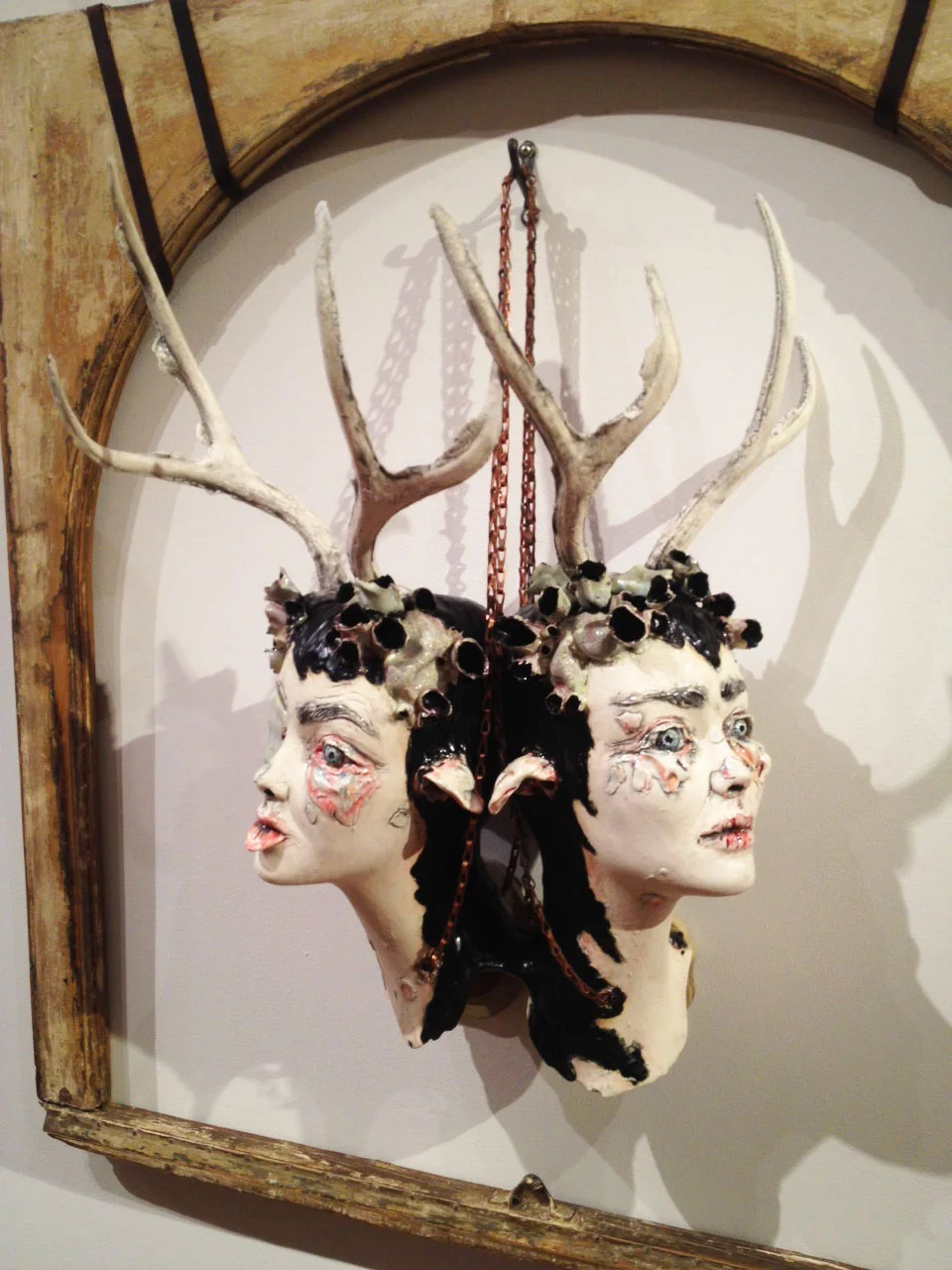 Chains Keep Us Together ceramic, leather, metal and wood 37"x37"x12"