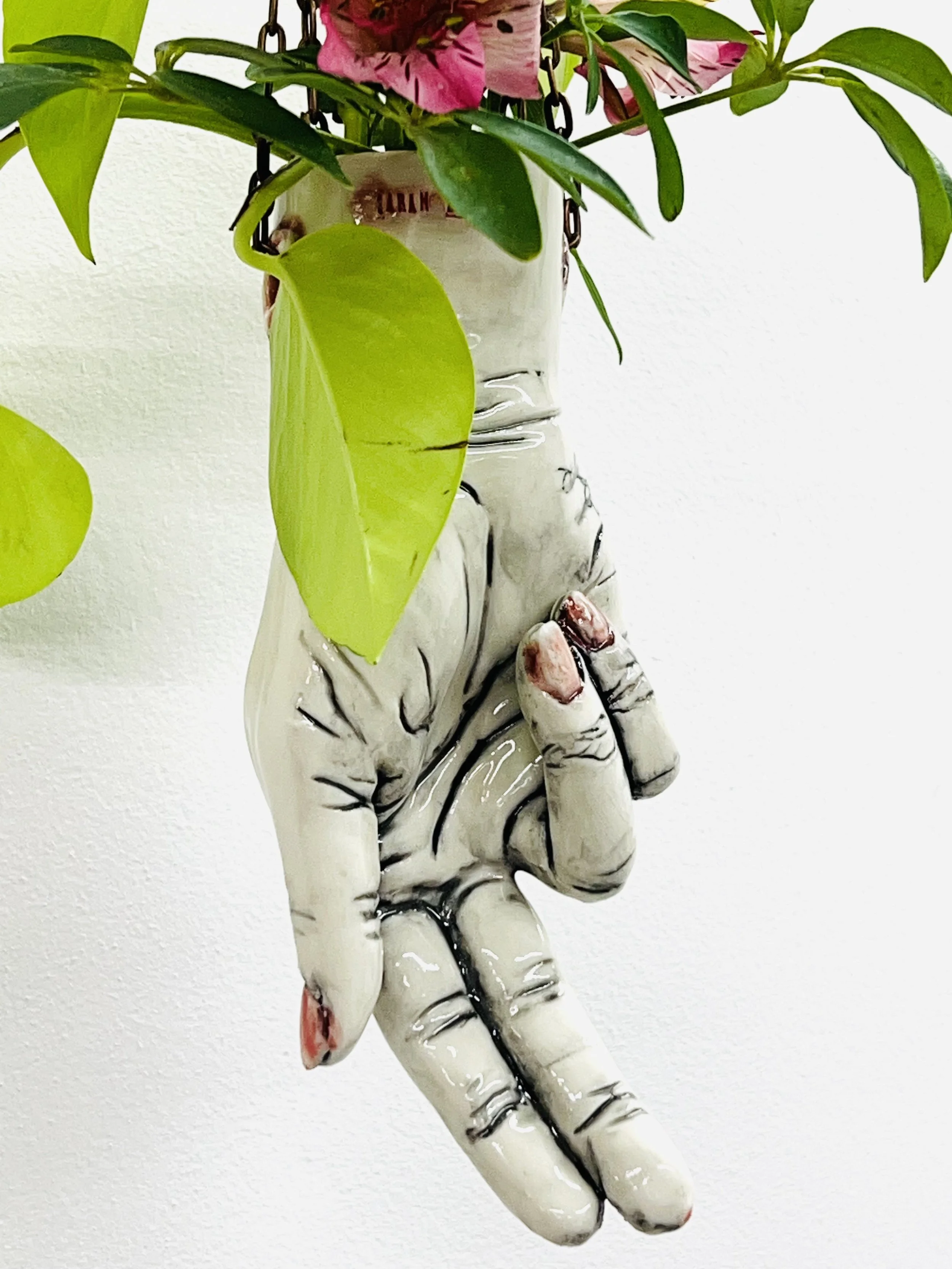 R lg two finger tattoed hand 5.jpg