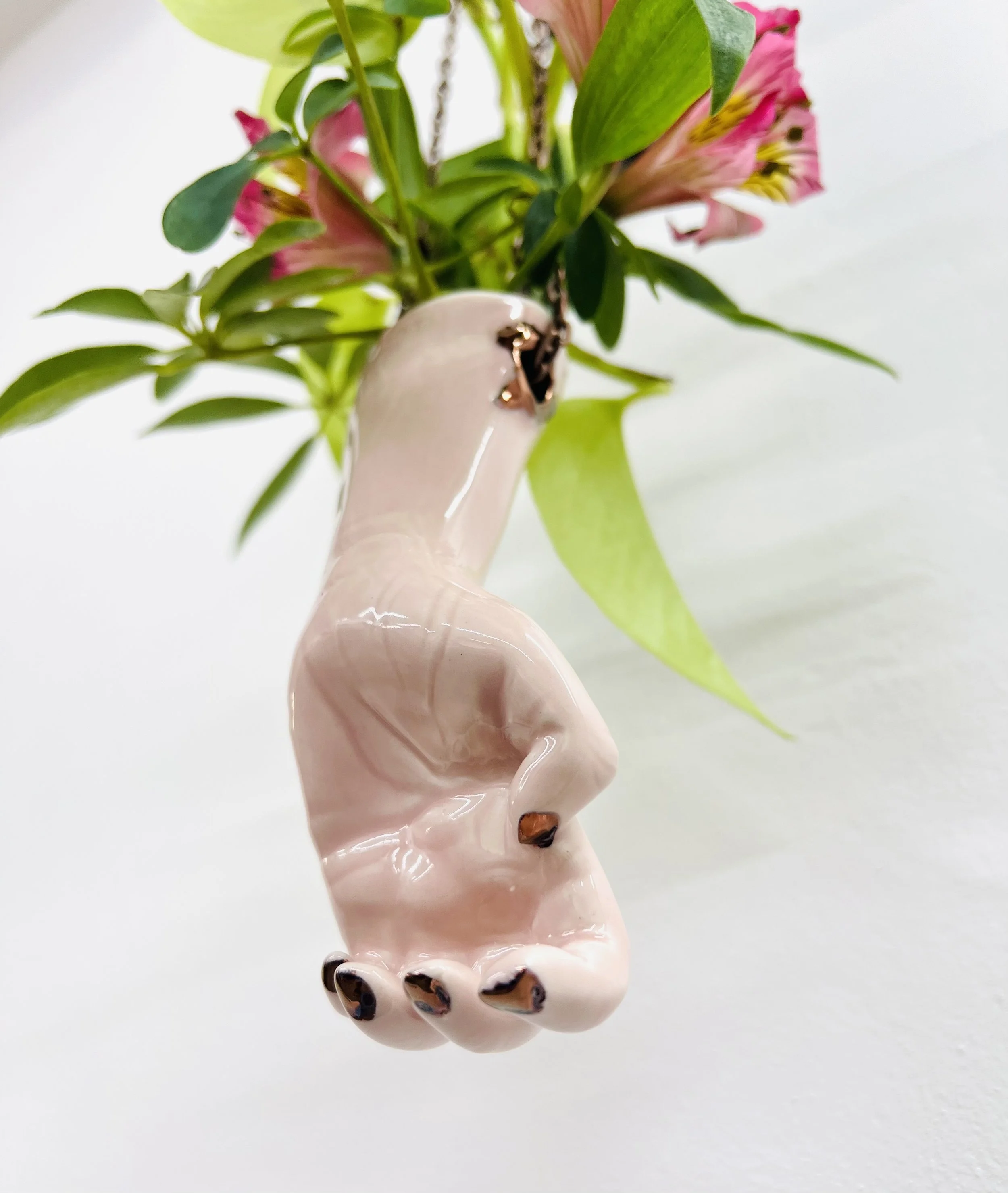 sm left pink curled hand 1.jpg