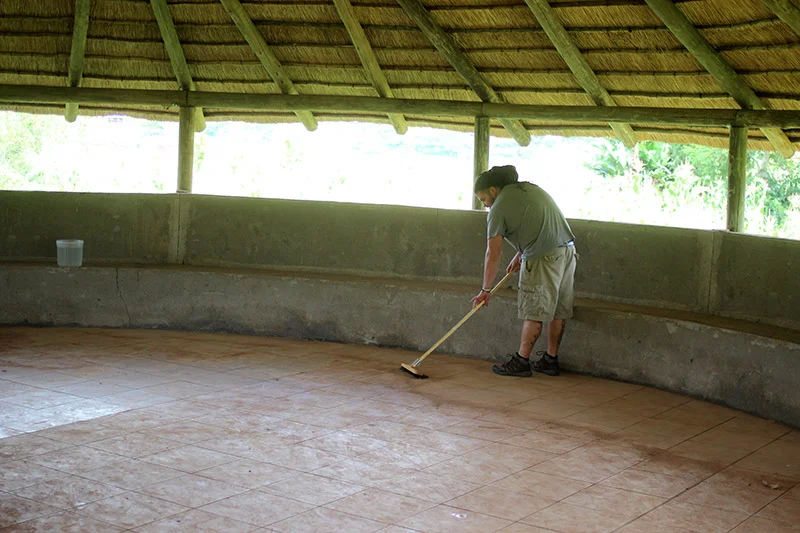 Jordy, along with Zach and Jon tackled the task of cleaning the prayer hut floor. Due to recent heavy rains, it was flooded with mud and water. The hut was unusable and the families did not have their usual place of gathering and prayer. By the end of the day, the floor was shiny and all of the orphans were playing on it.