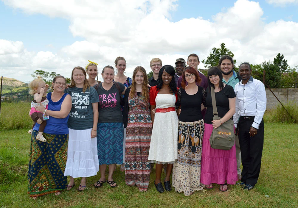 Our last Sunday in South Africa we visited Pastor Surprise's church to reunite with Teiza (with baby) and Rose (in white dress).