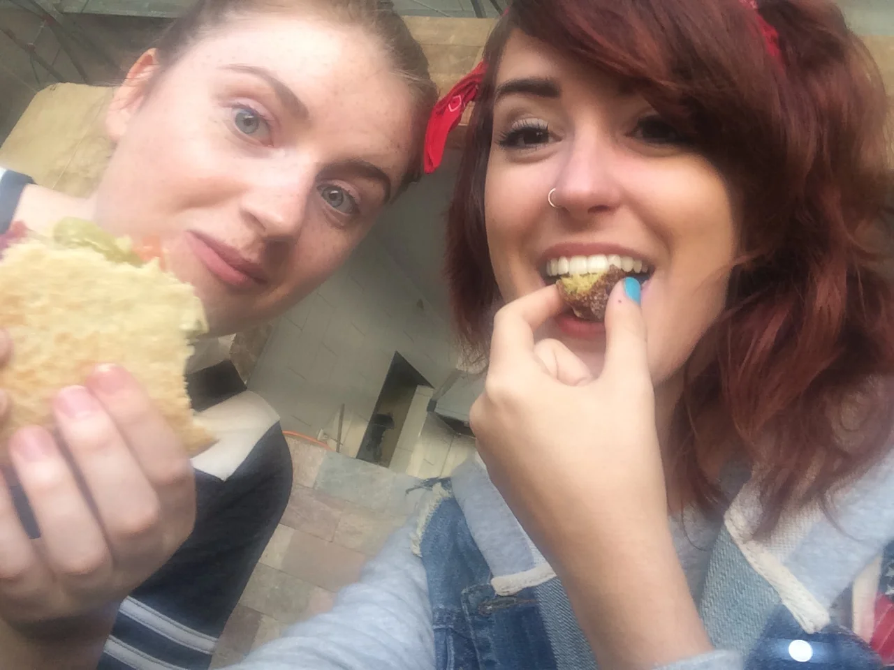 Eating Middle Eastern falafels and shawarmas for lunch