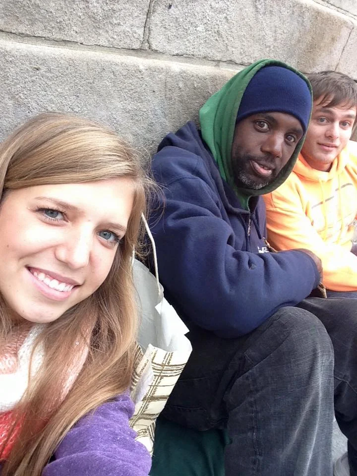 Chandler and Rachel giving a care package to their new friend!