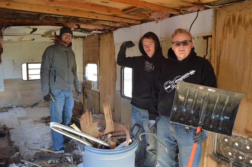 Some of the guys clearing out a trailer that will be used for storage for upcoming ministry supplies! 