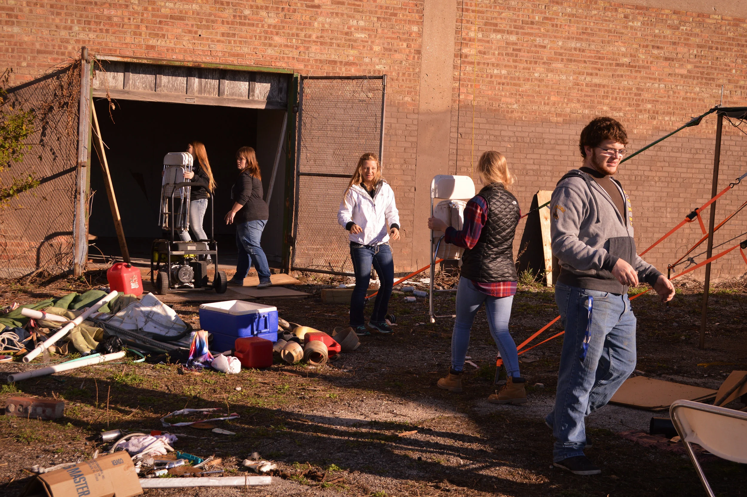 Helping the GAP Center tear down the tents that had been used for revival services & cleaning up the area where their new church will be held!
