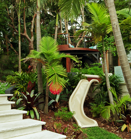 A gorgeous tree house we dreamt up, which is integrated with the family adult space via the slippery dip