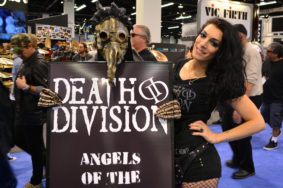 Some heavy promoting going on for band, "Death Division." NAMM 2015. ©WoTR Radio