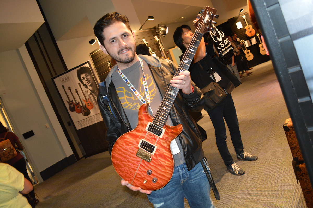 Frank holding one of the limited edition Santana guitars @ PRS. NAMM 2015. ©WoTR Radio