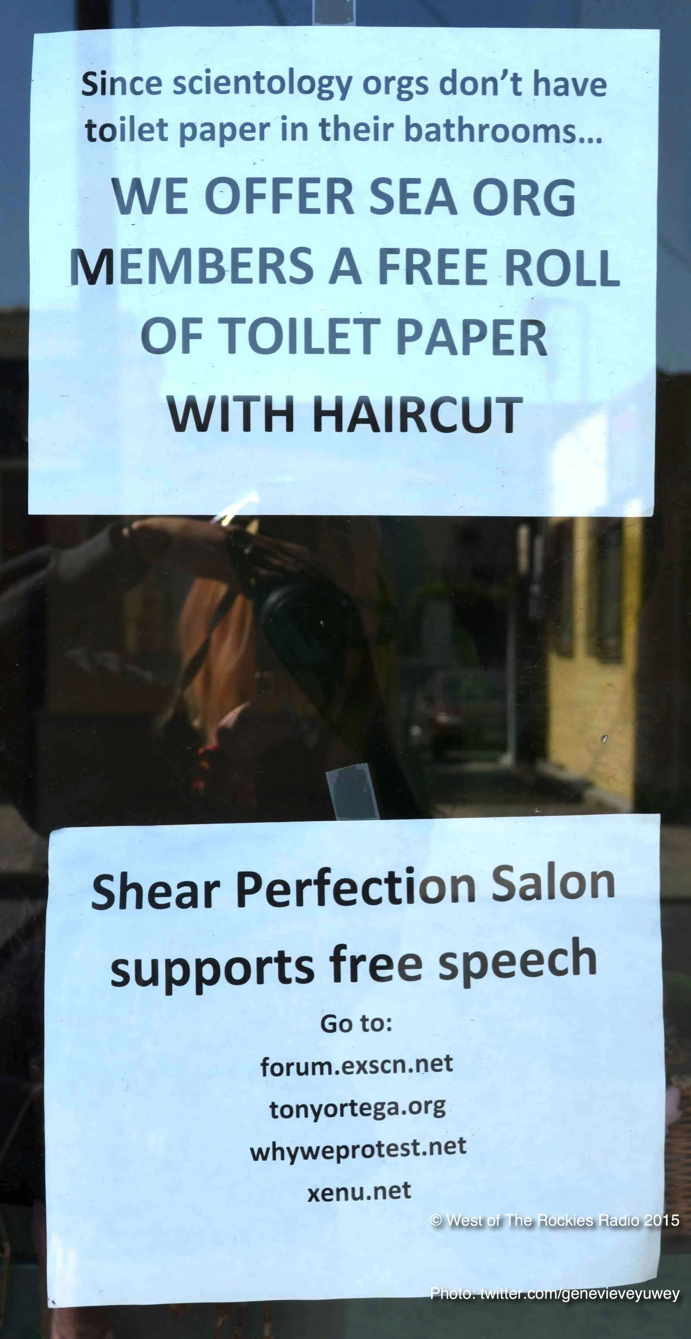 Signs posted by Lynn on her shop window.