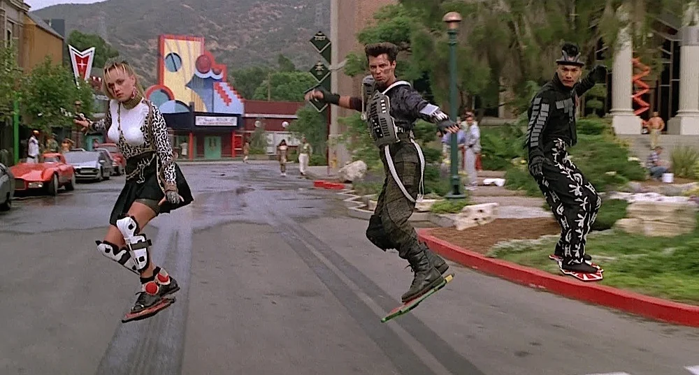 The “baddies" (a gang consisting of Griff Tannen, Data, Spike, and Whitey) riding on Hover Boards. From the movie Back To The Future II .
