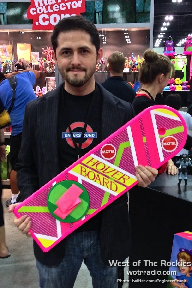 Our very own Engineer Frank, proudly holding a Hover Board. Look at that smile.