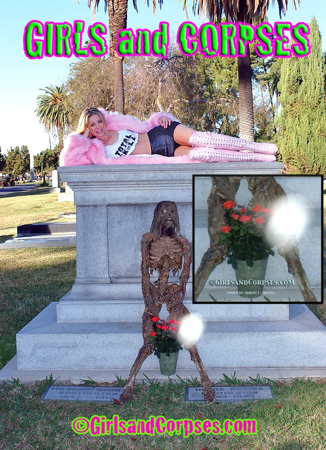 Sheri Moon Zombie, posing alongside Rob Zombie’s corpse – note the strange white orb by the flowers. Photo courtesy of Girls and Corpses.