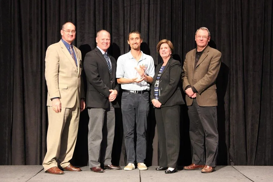 Above: Pablo Beimler accepts the Wildfire Mitigation Innovation Award on behalf of Hawaii Wildfire Management Organization.