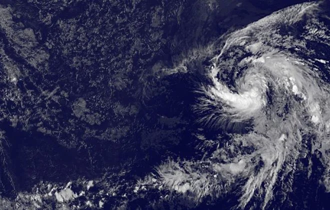 "Tropical Depression 6E, which formed in the Eastern Pacific over the weekend, was captured in an image at 7 p.m. Sunday by the GOES-15 geostationary satellite. Hawaii is in the upper left corner of the image. Tropical cyclone activity usually increases in El Nino years such as 2015." Credit - Honolulu Star-Advertiser