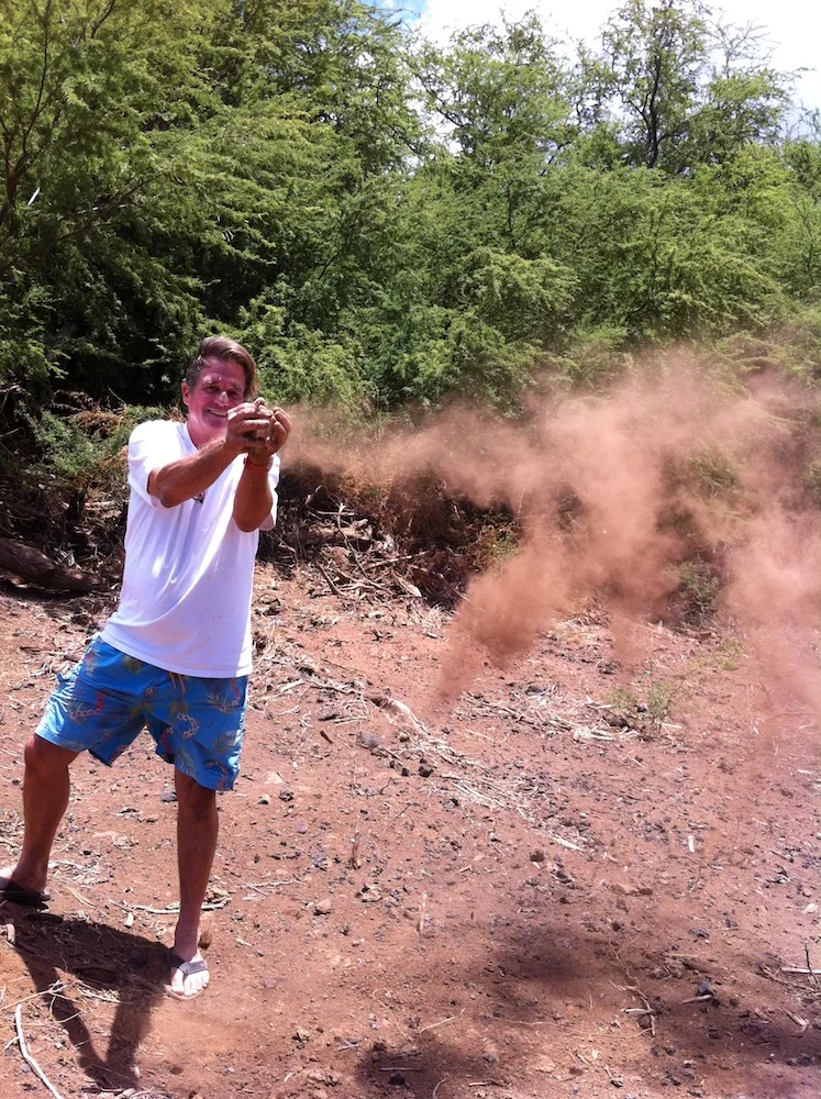 The mulched break also protects the village from fine dust particles that either blow into people's homes or gets swept into the precious coral reef only a few hundred feet away.