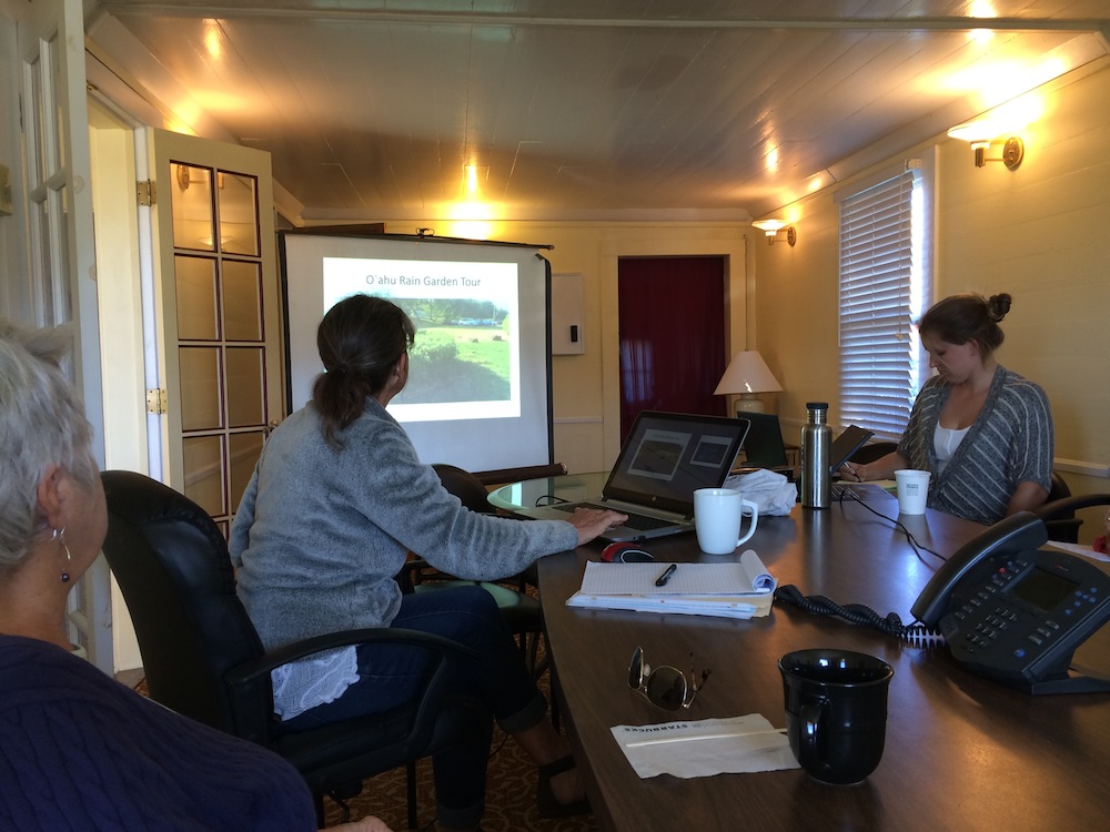 New coordinator Lisa Ferentinos gives a presentation about her background in conservation and restoration.