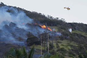 "Firefighters battled a brush fire in upper Makakilo in August 2014. Authorities later determined that the fire was started by two boys playing with a lighter." (Krystle Marcellus/Honolulu Star Advertiser)