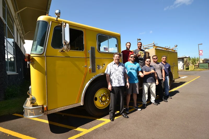 "Hawai’i Community College Fire Science students and instructors from the Fire Science and Diesel Mechanics programs stand with the fire engine, donated recently by the Honolulu Fire Department. Back row: Matthew Winters, left, and Jacob Smith. Front row, left to right: Fire Science Instructor Jack Minassian, Kawai Ronia, Jayce Ah Heong, Michael Rangasan, and Diesel Mechanics Instructor Mitchell Soares. Hawai’i CC courtesy photo." (Credit: Big Island Now)