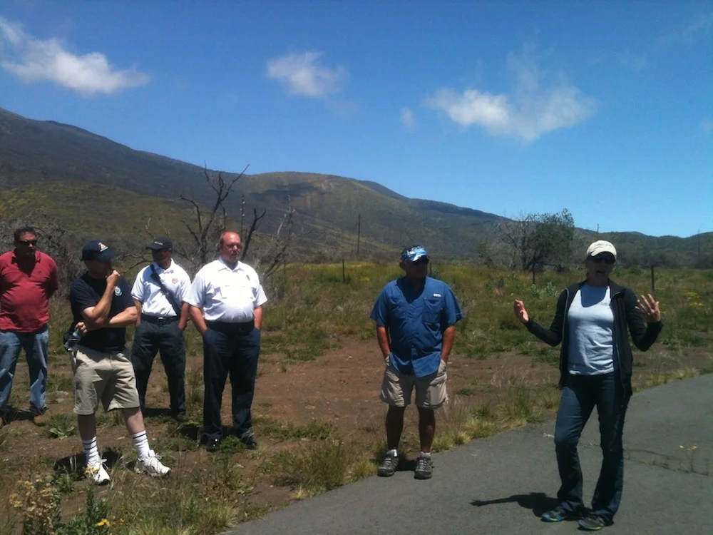 Mauna Kea Fire Field Tour on second day of 2014 CNH Conference. Credit: HWMO