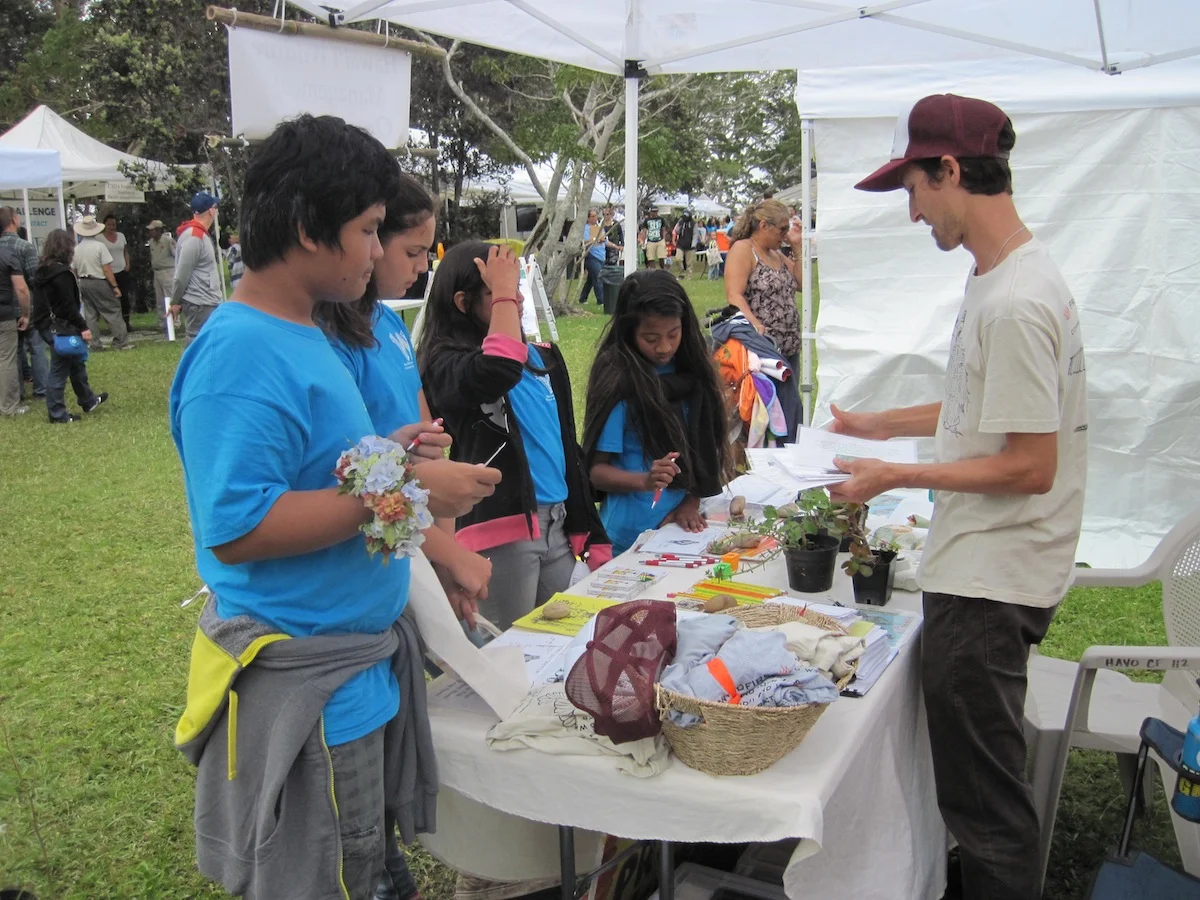 Numerous students dropped by last yearʻs event to learn about native Firewise plants and fire ecology.