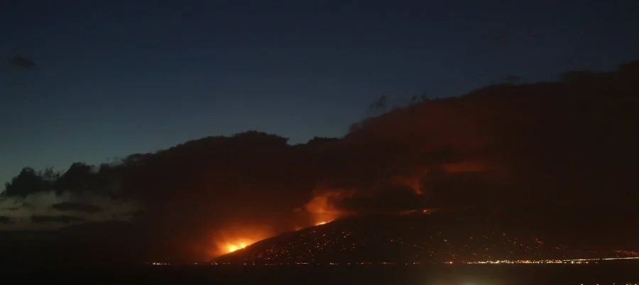 Maalaea glows at night from the intense fire. Credit: Catie Koraleski/Facebook