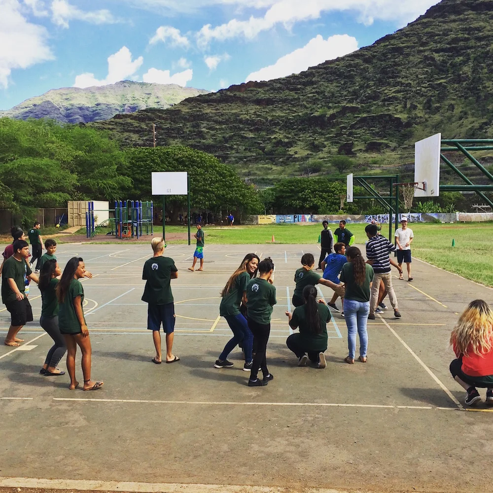 Students play fire tag to learn about the fire cycle with a fitting fire-prone landscape as the backdrop.