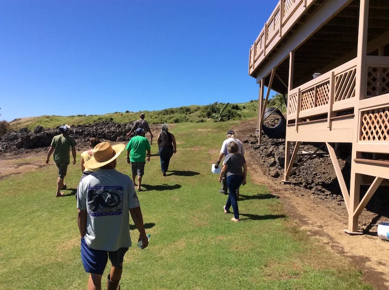 Assessment team walks the perimeter of a Firewise home within the community.