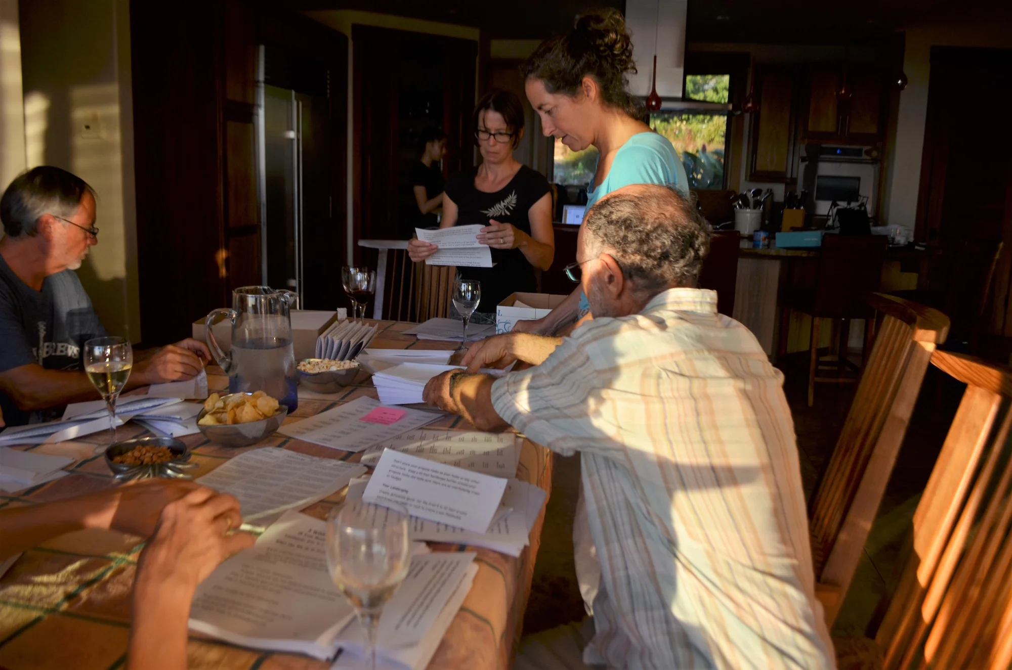 Launiupoko Firewise Committee members gathered together to put together wildfire preparedness mailers for over 350 residents.