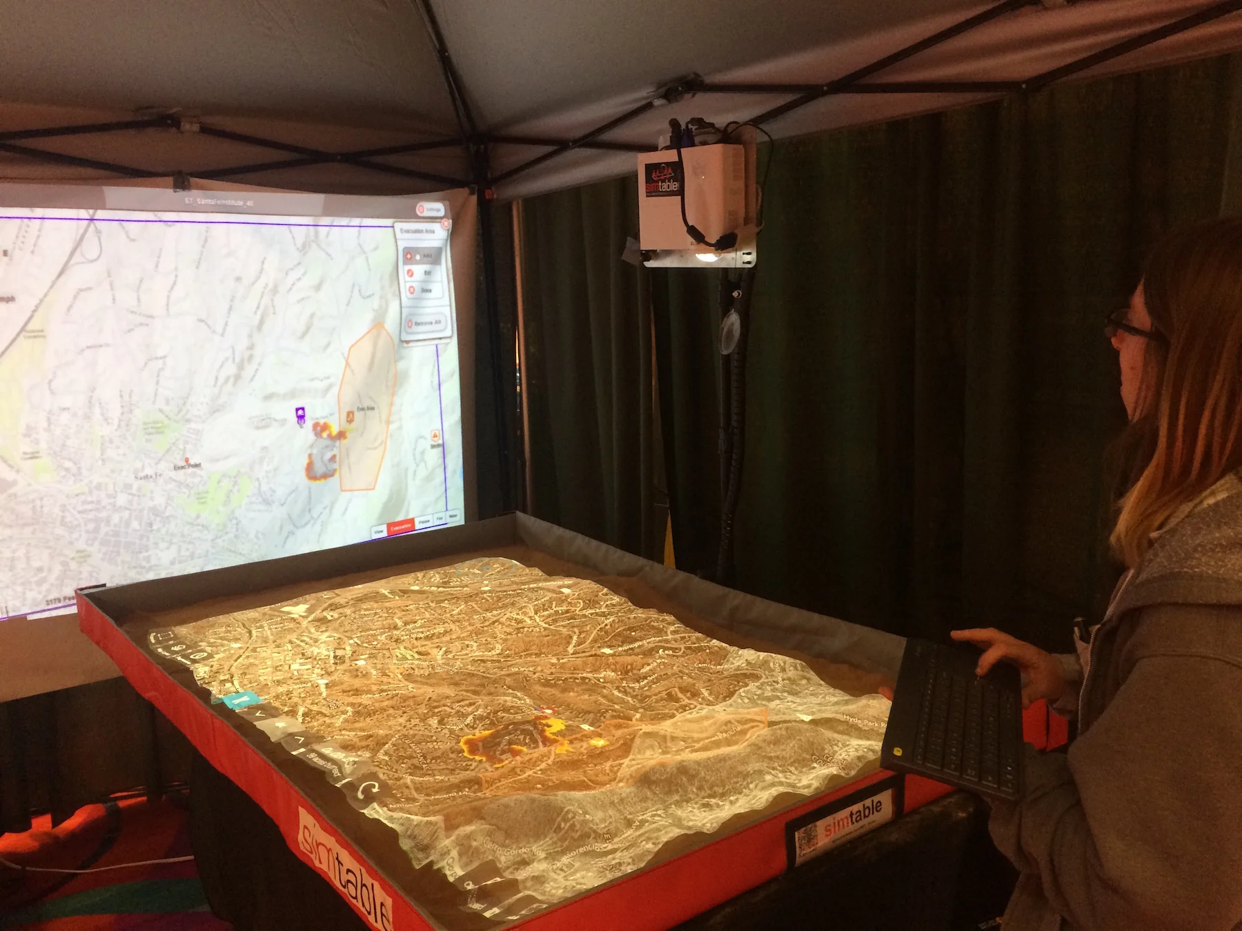 Simtable demonstration simulating fires and evacuation procedures.