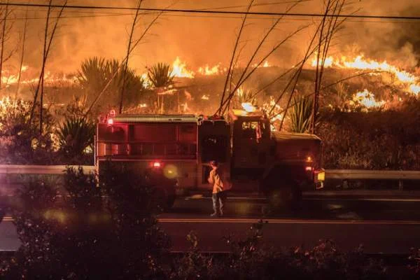 "The Hawaii Fire Department responded to a brush fire off Kawaihae Road on Tuesday night. Courtesy Colin Edsman"