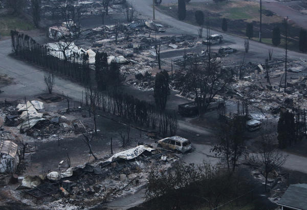 "The Boston Flats trailer park was destroyed by a wildfire in Boston Flats, British Columbia, Canada on Monday."