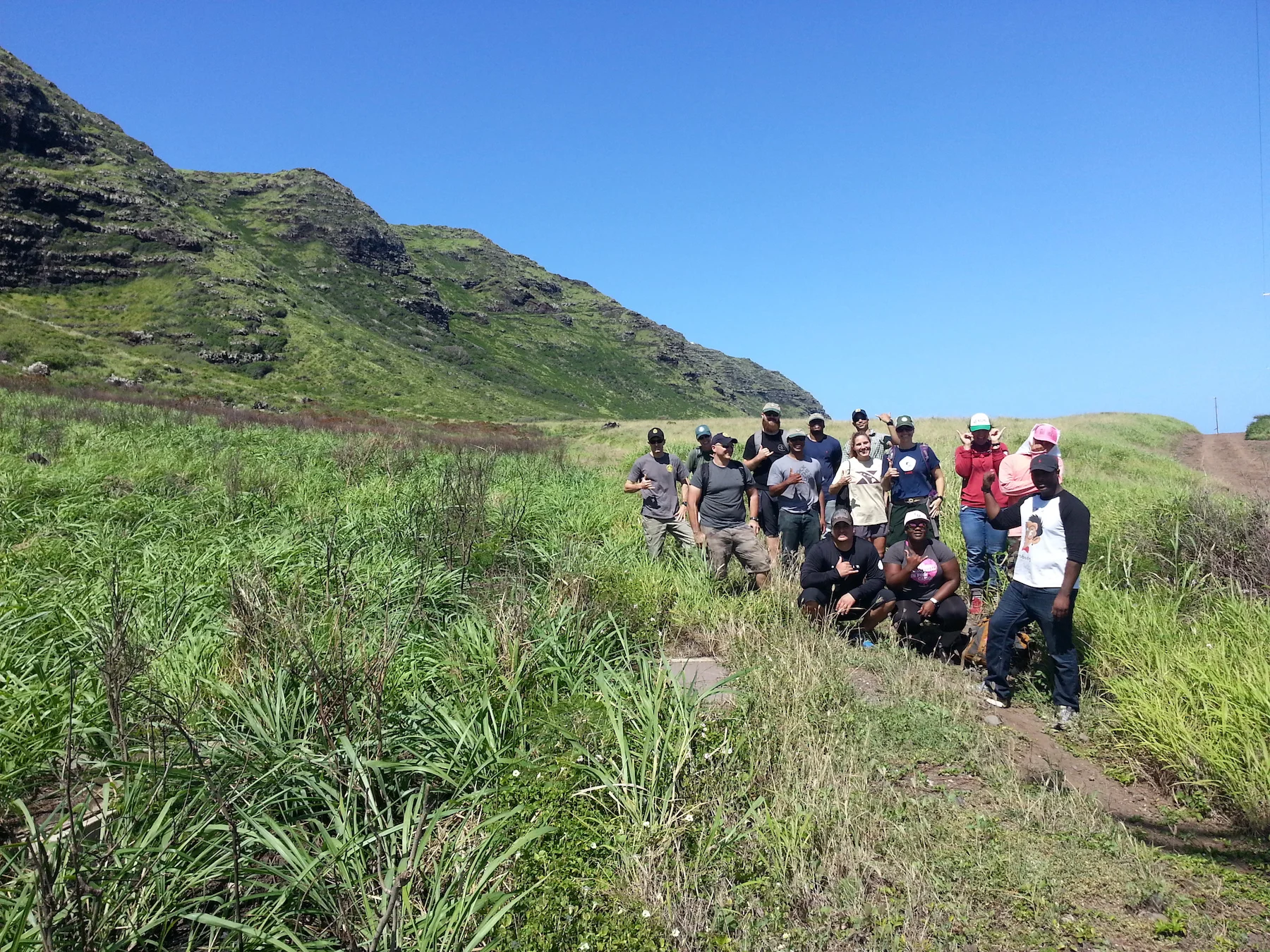 The volunteer group taking a tour of a recent burn at Kaʻena State Park. Credit - Dawn Bruns, US Fish and Wildlife Service
