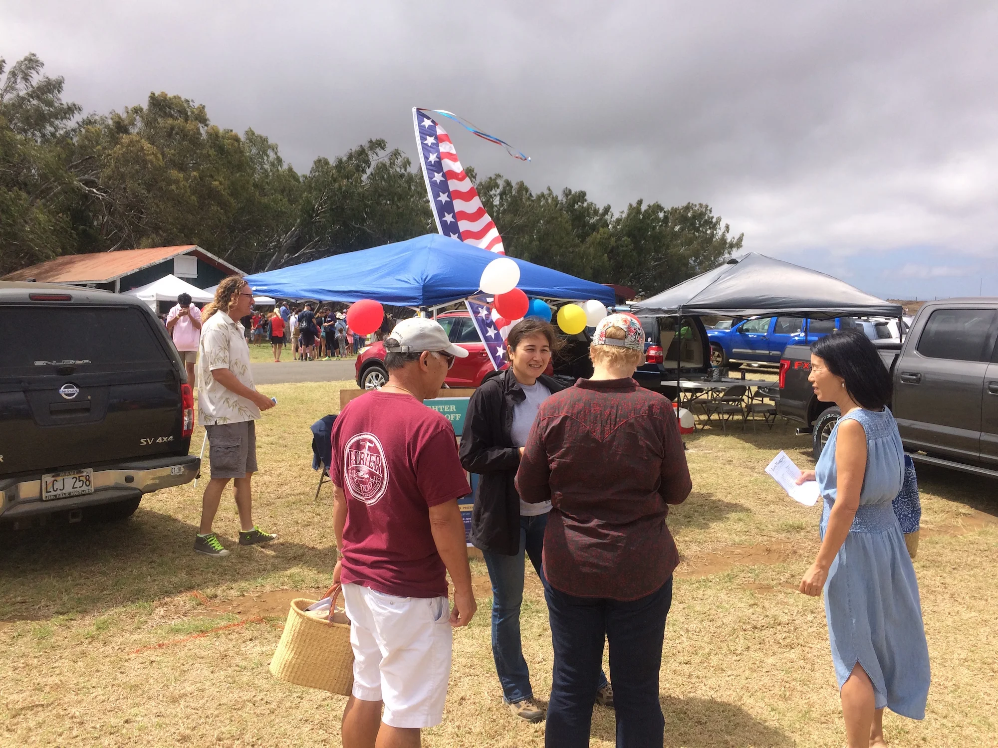 Melissa Kunz of HWMO talking to visitors about the upcoming Firefighter Chili Cook-Off.