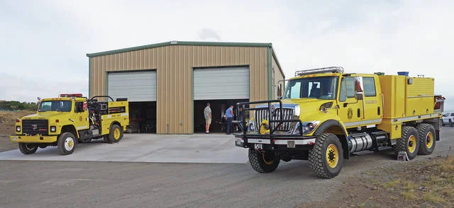 "9 Bravo’s two fire trucks are displayed outside the new building July 20 for the open house event. The facility is located between Mauna Lani and downtown Waimea. (LANDRY FULLER/SPECIAL TO WEST HAWAII TODAY)"