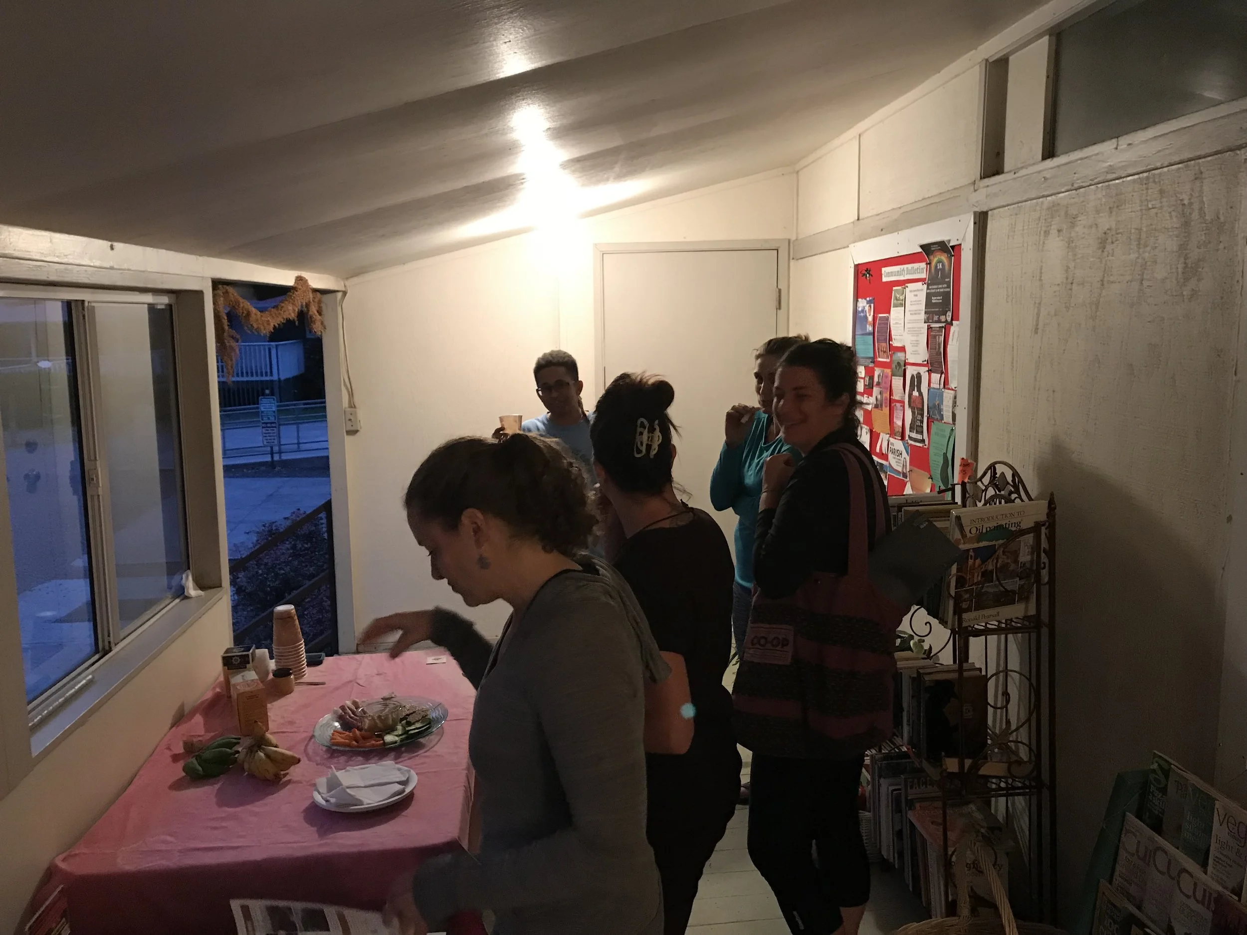 Yoga for a Cause - HWMO Fundraiser_2018_11_8_Gathering for wildfire talk story in the halls after class.jpeg
