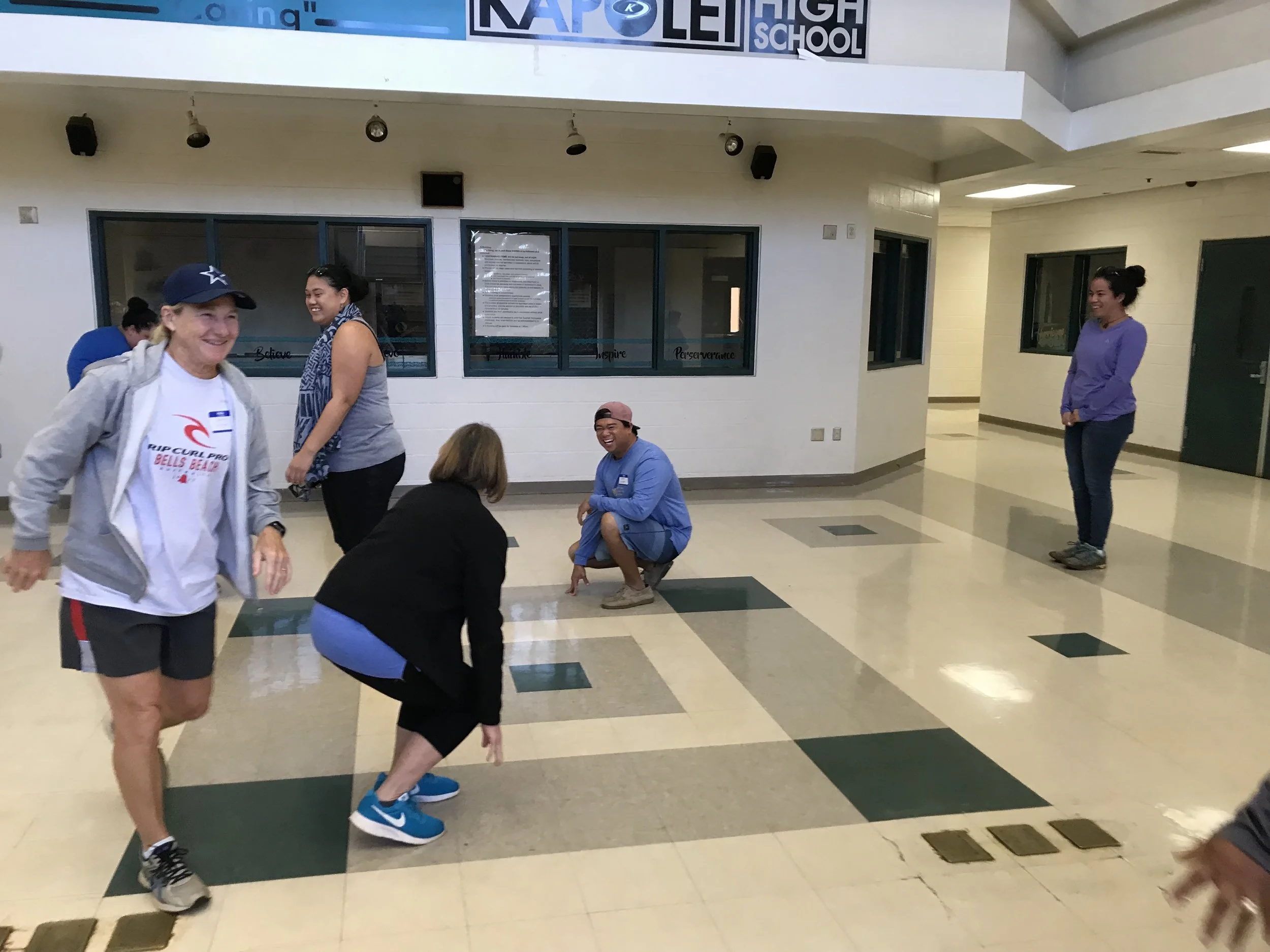 West Oahu teachers play a round of “Fire Tag.”