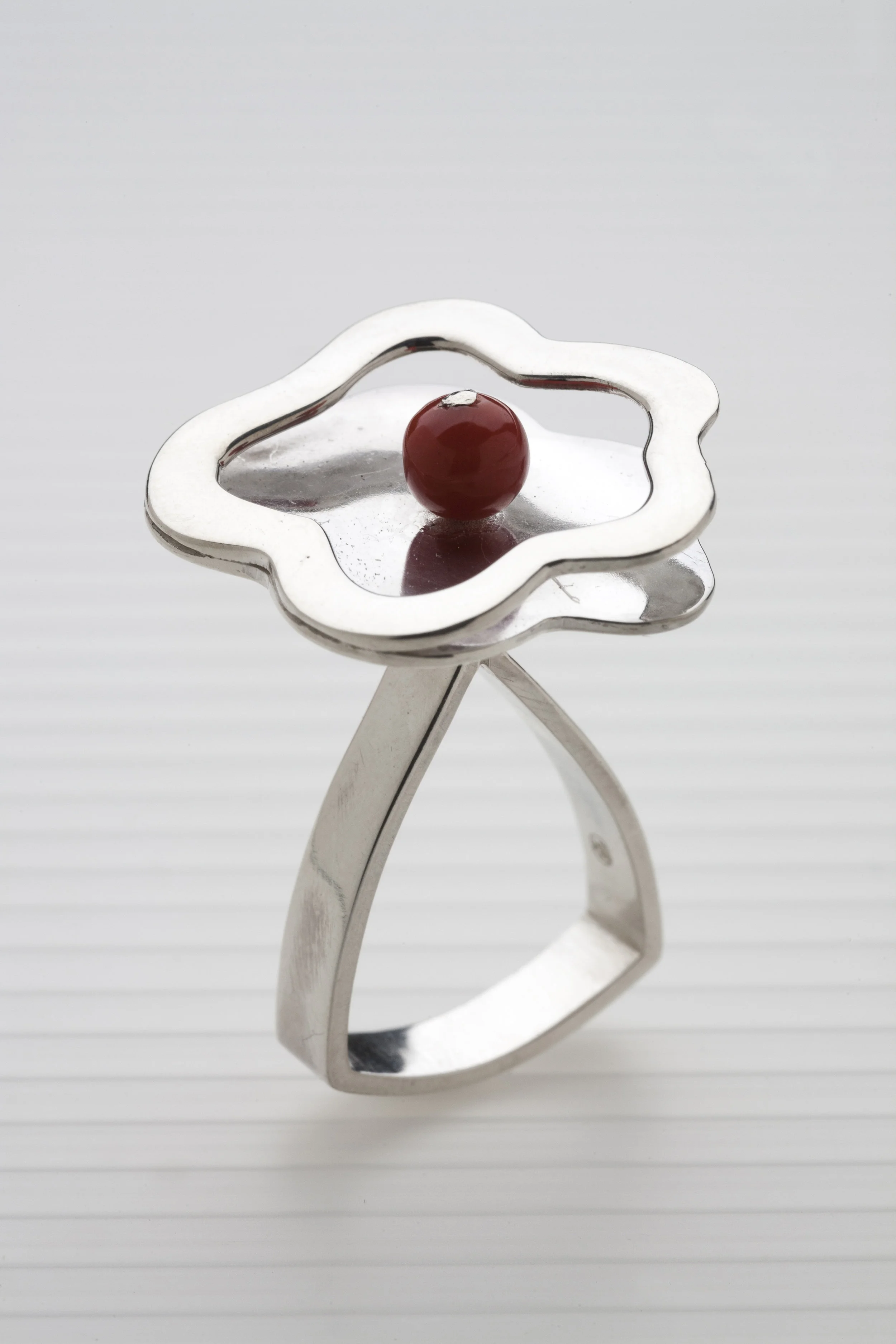 sterling silver, coral, 14 kt gold 3” x 2.75” x .75”