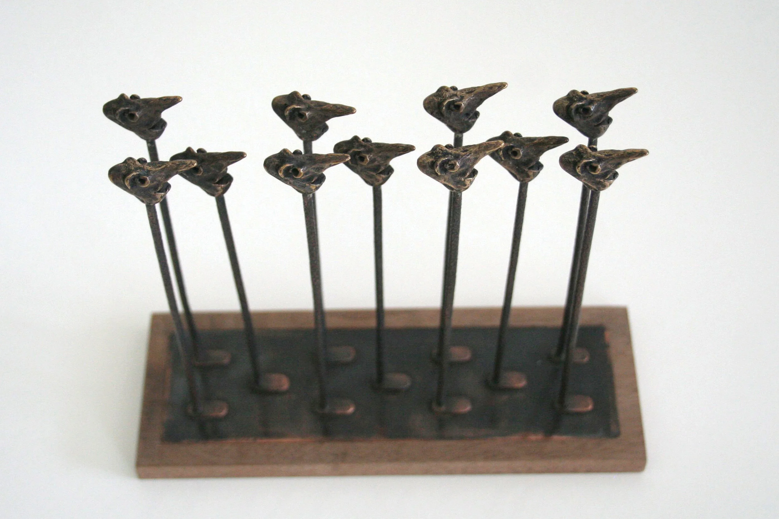 bronze, copper, hardwood base 5.9” x 6.65” x 2.45”