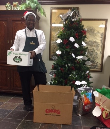 Thomas Bell, representing Cory's delivering a meal for a homebound senior.
