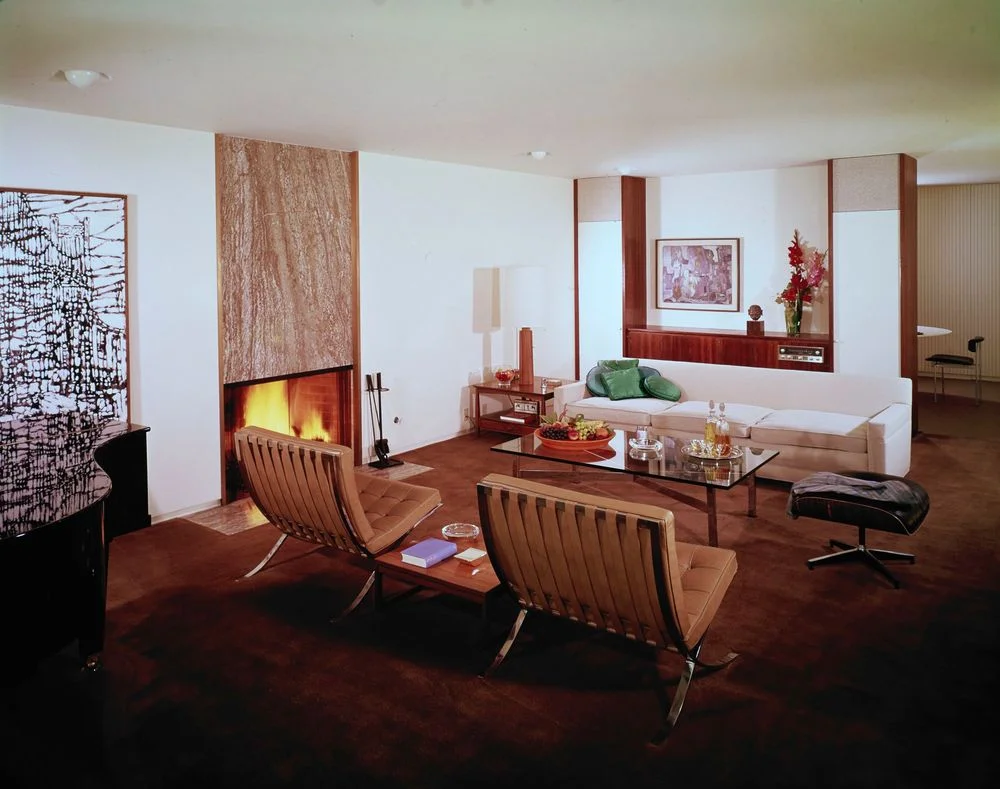 Barcelona chairs and coffee table mix with an Eames ottoman and Van Keppel-Green sofa in the Long Beach home of Eddie Frank (Case Study No. 25)&nbsp;© J. Paul Getty Trust. Getty Research Institute, Los Angeles (2004.R.10)