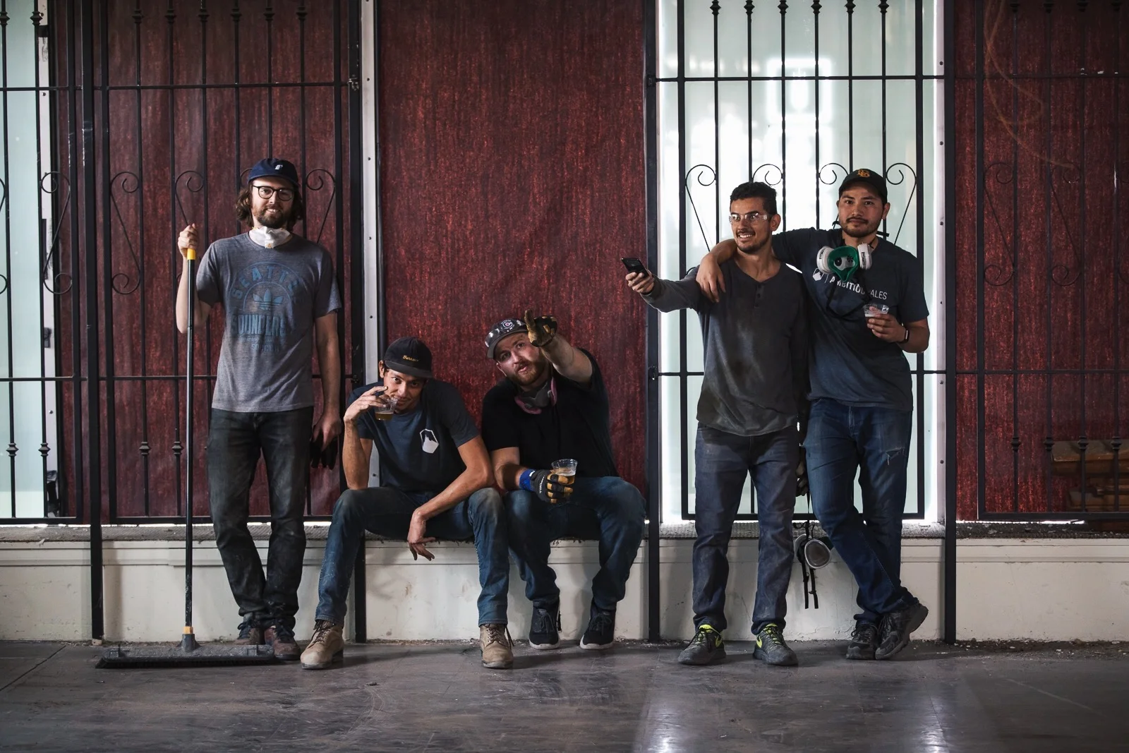 Left to right: Danny Karpinski, Jon Cuthbert, Garrett Carroll, Juan Carrillo and Jerome De Leon enjoy beers while taking a break from construction.