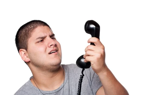 cutcaster-902449422-Man-Screaming-Into-the-Telephone-small.jpg