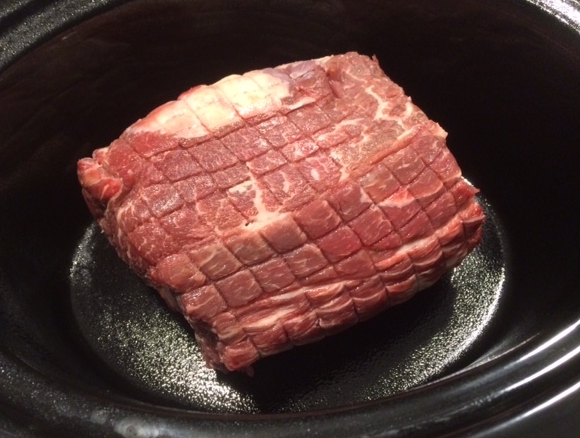 If yours happens to have rope, make sure to cut it off and place in the crock pot.