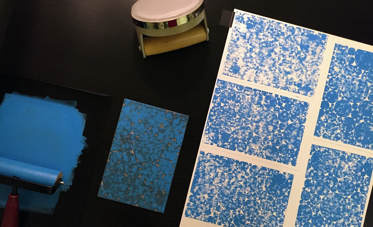 I carved a 4x6 piece of the lino and printed first, then trimmed out the postcard to their final dimensions. In doing so, I lost the more natural edge but the printing was easier. The paper soaked up a lot of ink. With such heavy coverage, a smoother paper might have given me better results.