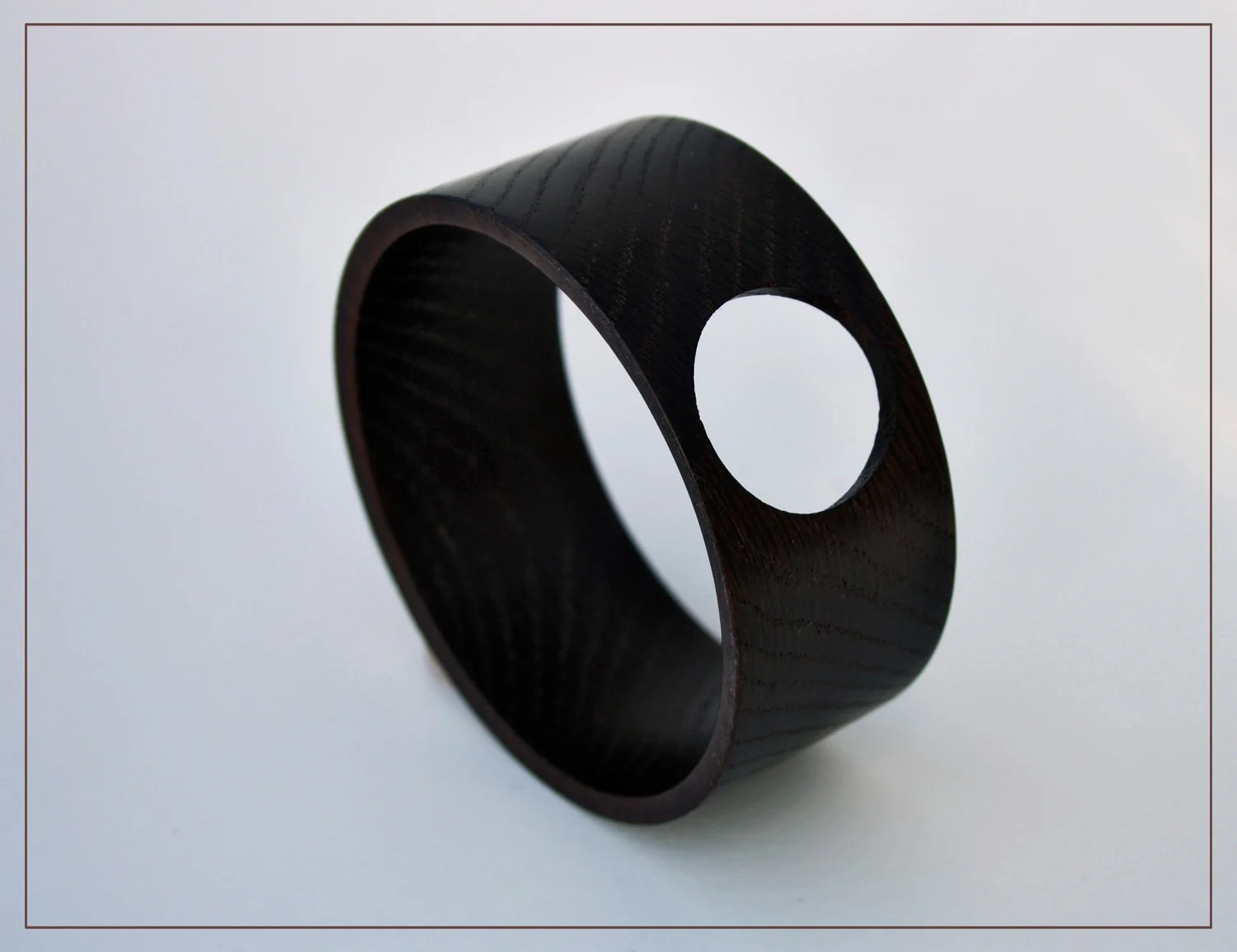Plain fumed oak cuff with hole