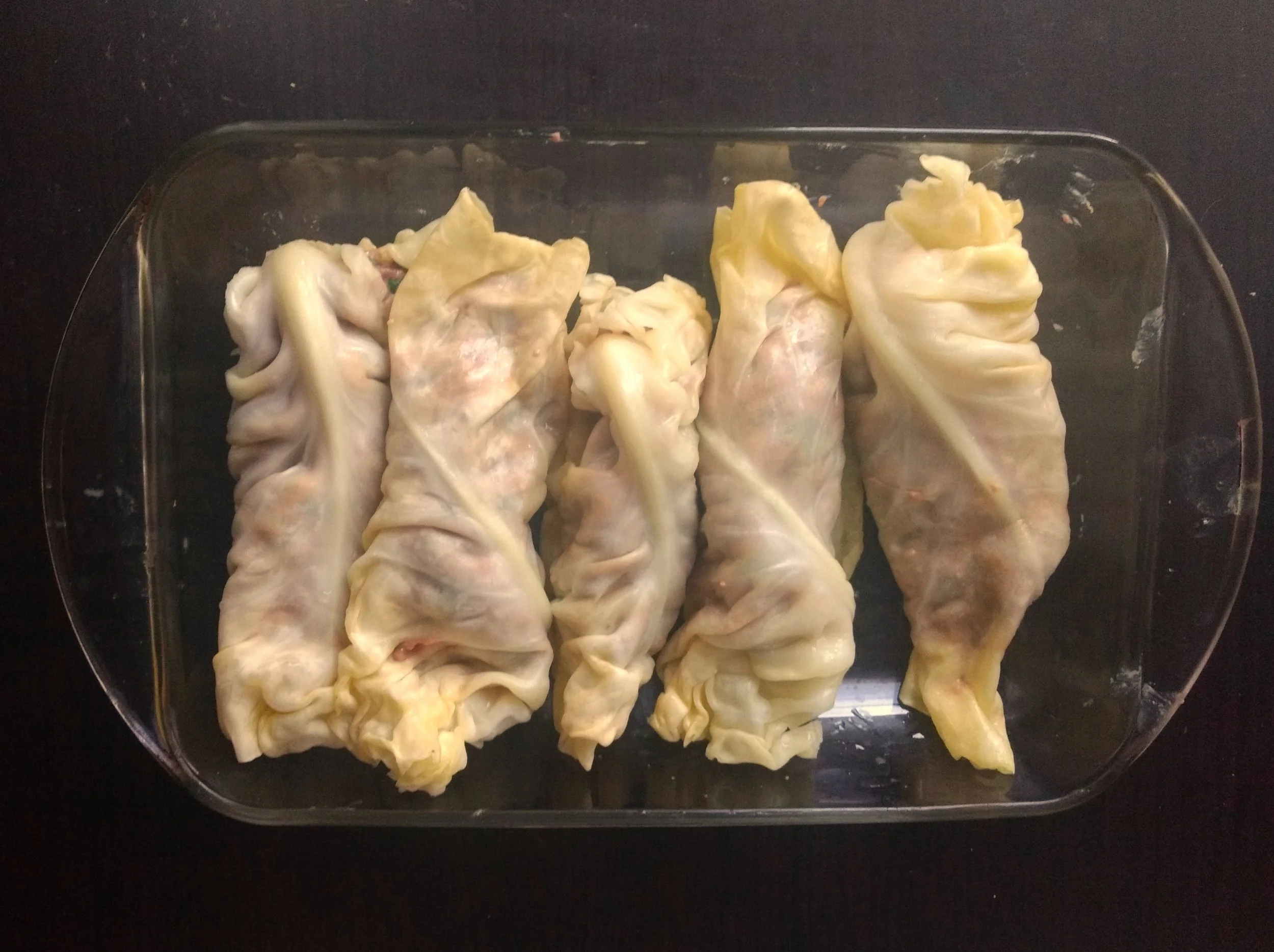 2-Place each one on the prepared baking dish, and place in the preheated oven and bake until the leaves are just browned at the edges and the filling is cooked through (it should register 155°F on a meat thermometer), about 35 minutes. Serve with green tahini and cauliflower rice.