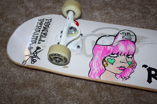 My personal skateboard that I doodled on- however the pink hair is not Posca it is Sharpie paint pens and it started to bleed. woops.