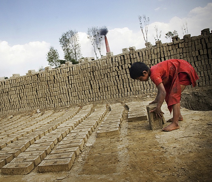 From a young age, children work long hours in dangerous conditions at brick factories to support family income